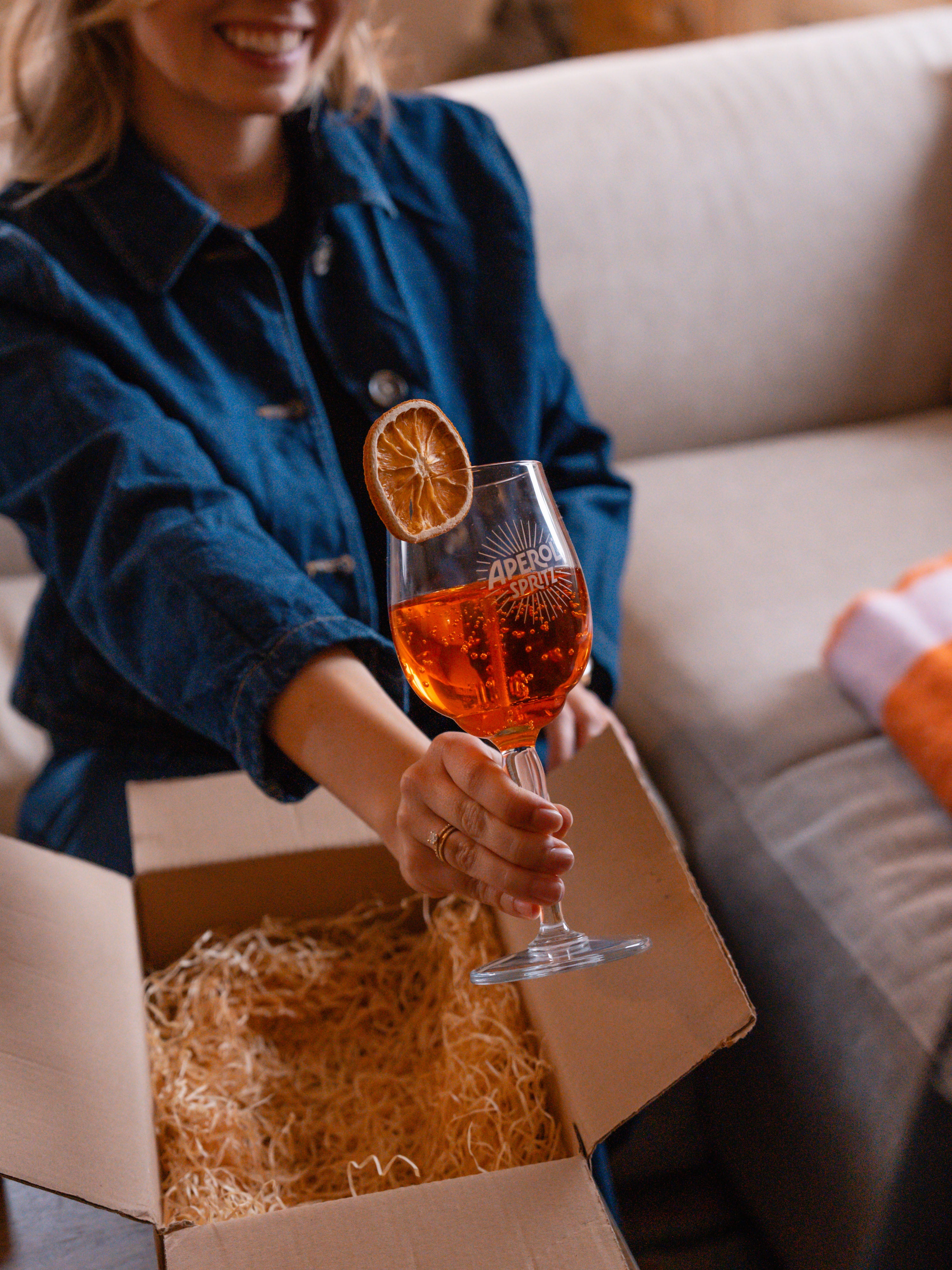 Unpacking an Aperol Spritz candle gift